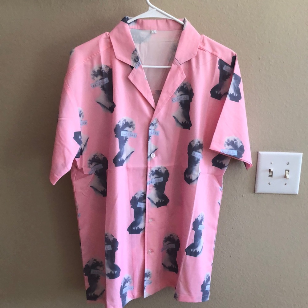Pastel Pink button up shirt.